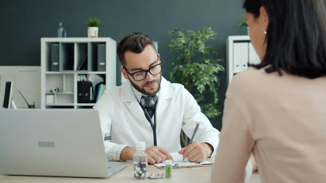 Physician meeting with a patient during a medical weight loss consultation